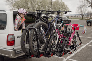 Rack loaded with kids bikes