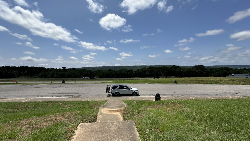 A lone vehicle in a parking lot