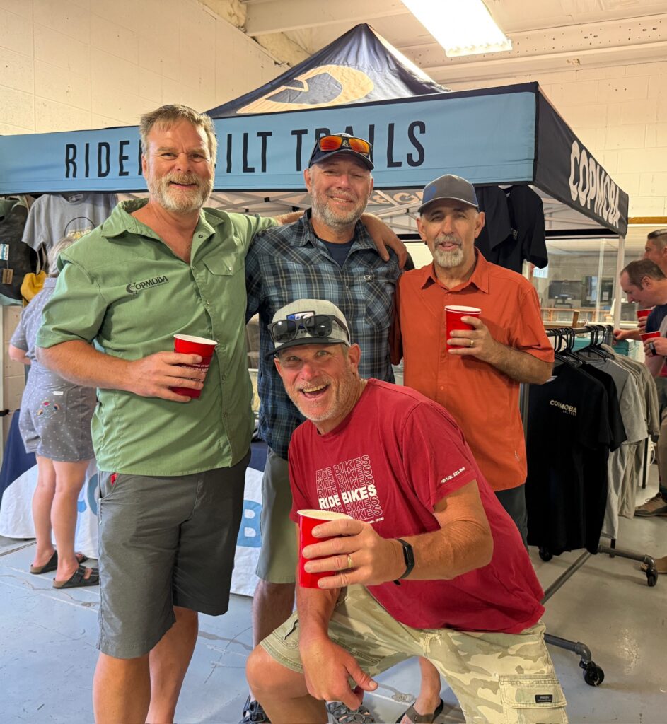 Riders enjoying a beer at Stoke Night