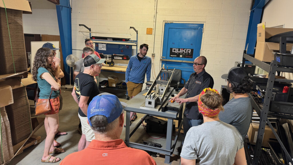 Engineer Nick gives a tour at the QuikrStuff factory