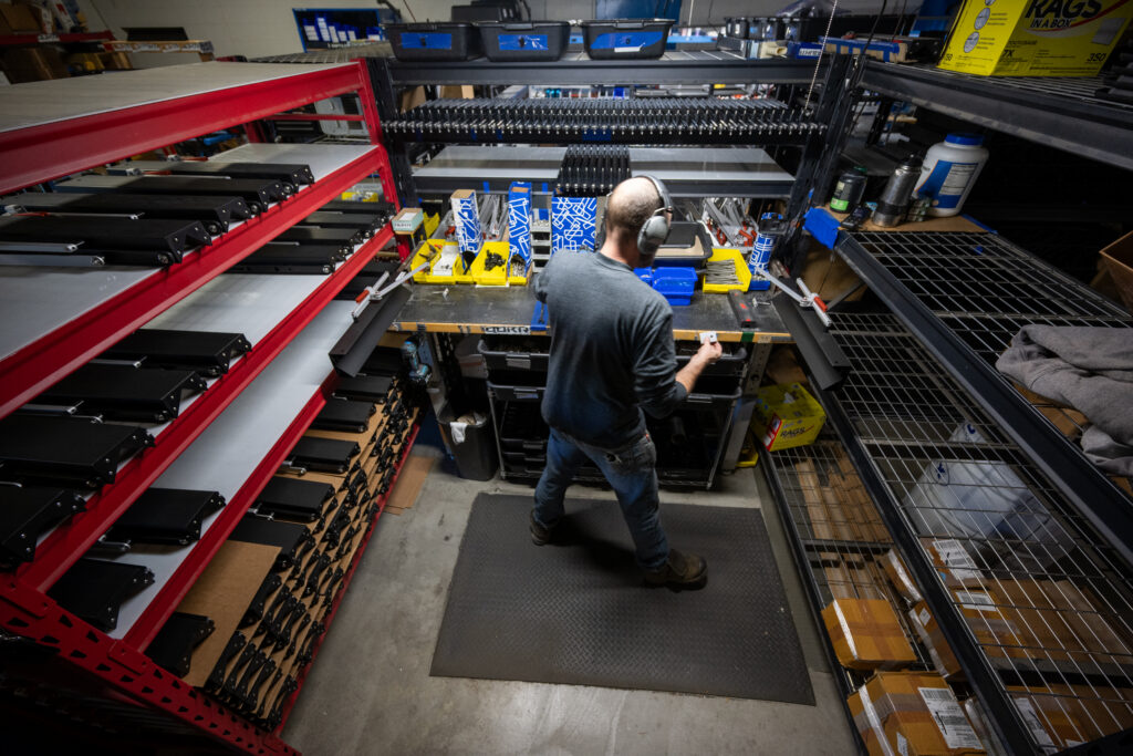 technician assembling a bike rack
