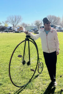 Tim next to his Penny Farthing bicycle