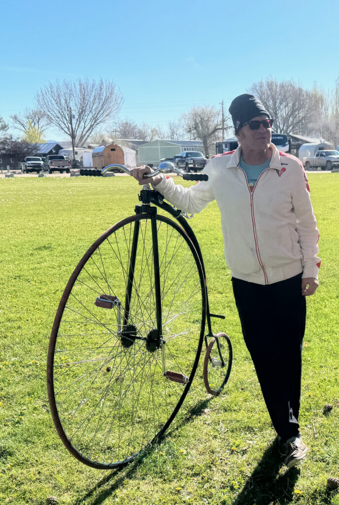 Tim next to his Penny Farthing bicycle
