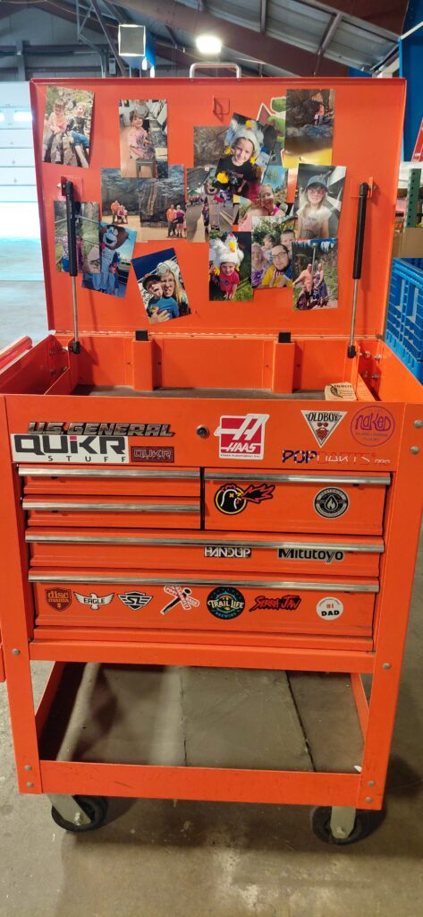 Zane's toolbox with photos of his family